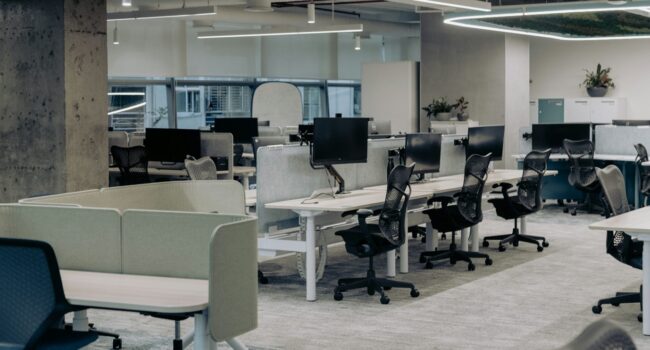 A bright and spacy office with pendant linear light