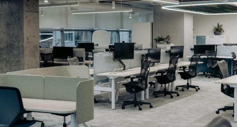 A bright and spacy office with pendant linear light